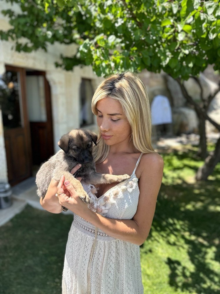 Holding one of the rescued puppies