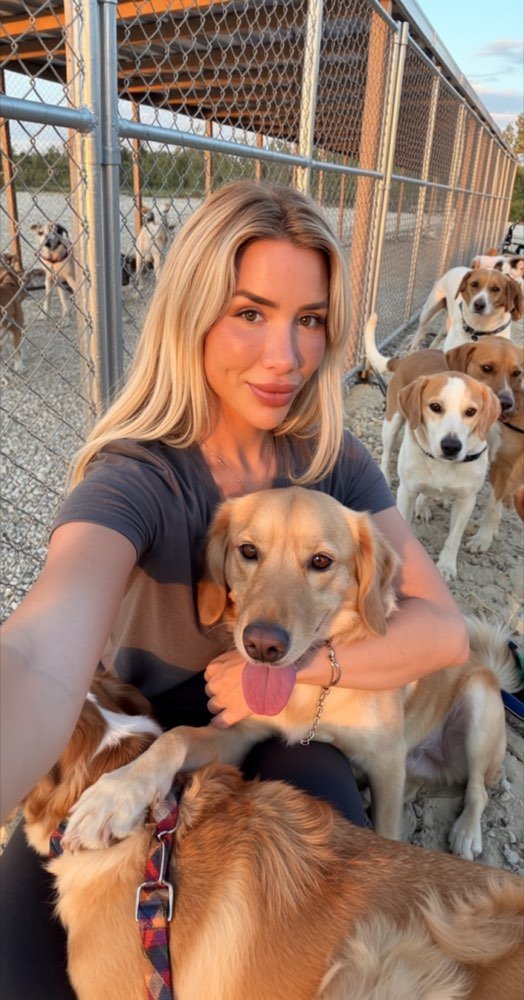 Holding one of the rescued dogs
